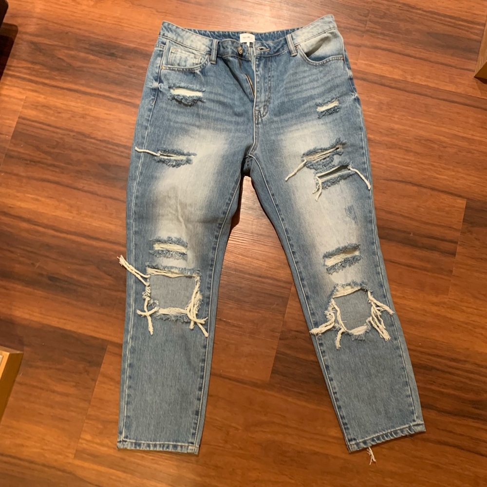 Distressed boyfriend fit jeans